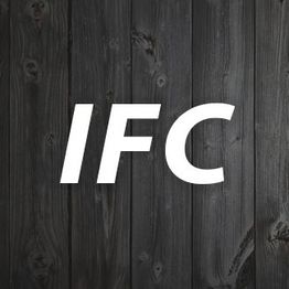"White 'IFC' text on a dark wood plank background."