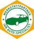 Grünes Autosymbol in einem gelben Sechseck, umgeben von "Werkstattpartner Ihr Auto-Spezialist".