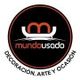 Logo de "Mundo Usado" con texto: "Decoración, Arte y Ocasión" en círculo negro.