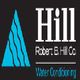 Logo for Robert E. Hill Co., featuring a blue triangle and white text on a black background.