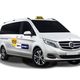 Furgone taxi bianco con logo e numero di contatto sul lato, marchio Mercedes-Benz.