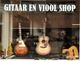 Winkelraam met drie gitaren. Tekst bovenaan: "Gitaar en Viool Shop".