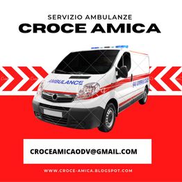 Furgone ambulanza bianco con scritta "Croce Amica" e contatti su sfondo rosso.