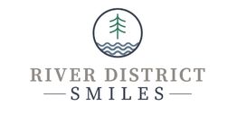 River District Smiles logo with a tree above wavy lines in a circle.