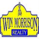 Yellow and blue sign reads "Win Morrison Realty," featuring a small tower illustration.