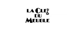 Texte noir "La Clef du Meuble" avec un dessin de clé intégré.