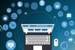 Laptop surrounded by social media icons on a blue background.