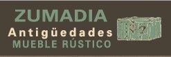 Texto "ZUMADIA Antigüedades Mueble Rústico" con ilustración de caja rústica verde.