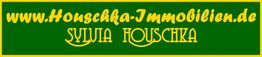 Grünes Banner mit gelber Schrift: www.Houschka-Immobilien.de, Sylvia Houschka.