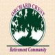 Logo of Orchard Crest Retirement Community featuring a stylized tree.