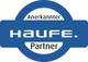 Blaues Logo mit der Aufschrift "Anerkannter Haufe Partner".