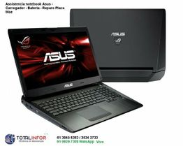 Notebook Asus aberto com logo no visor ao lado da tampa traseira fechada, fundo branco.