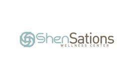Logotipo de ShenSations Wellness Center con letras azules y marrones sobre fondo blanco.