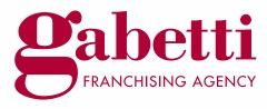 Logo "Gabetti Franchising Agency" in rosso su sfondo bianco.