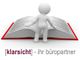3D-Figur vor einem großen aufgeschlagenen Buch. Text: "[klarsicht] - ihr büropartner".