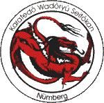 Logo mit rotem Drachen in einem Kreis, Text: "Karate-Dō Wadōryū Seishinkan Nürnberg".