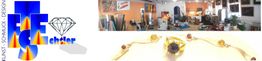Laden mit Kunstwerken und Schmuck, Logo links mit Text "KUNST SCHMUCK DESIGN" und stilisiertem Diamant.