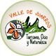 Logotipo "Valle de Juarros": flor, montañas y texto "Turismo, Ocio y Naturaleza".