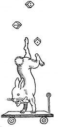 Kaninchen macht Handstand auf Rollbrett, jongliert mit Würfeln.