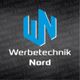Logo mit blauem "WN", Text: "Werbetechnik Nord", grauer Hintergrund mit Schriftzügen.