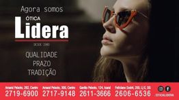 Mulher com óculos de sol e óculo Lídera ao fundo. Telefones de contato na parte inferior.