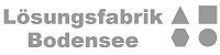 Logo mit Text "Lösungsfabrik Bodensee" und geometrischen Formen: Dreieck, Quadrat, Fünfeck, Kreis.