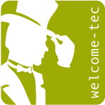 Silhouette eines Mannes mit Zylinder, grüner Hintergrund, Text "welcome-tec" vertikal.