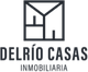 Logotipo de Del Río Casas Inmobiliaria con imagen de una casa estilizada.