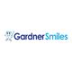 Logo of Gardner Smiles with a happy tooth cartoon holding a toothbrush.