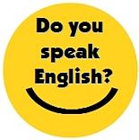 Gelber Kreis mit der Aufschrift: "Do you speak English?" und einem lächelnden Gesicht.