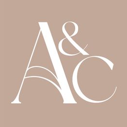 Stylish "A&C" logo on a beige background with elegant font.