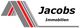 Logo von Jacobs Immobilien mit grauen und roten Linien, Firmenname in schwarzer Schrift.