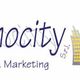 Logo di "Promocity" con skyline cittadino e sole giallo sullo sfondo. Scritta: Pubblicità & Marketing.
