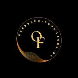 Schwarzes Logo mit goldenem Text "Oberberg-Fundgrube.de" und Initialen "OF" in der Mitte.