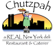 Cartoon woman holding food with New York skyline, text: "Chutzpah, a REAL New York deli."