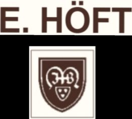 E. HÖFT-Logo mit einem Wappen, das stilisierte Initialen enthält.