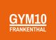 Oranger Hintergrund mit weißem Text: "GYM10 FRANKENTHAL".
