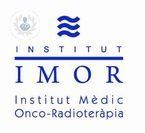 Logotipo del Institut Mèdic Onco-Radioteràpia (IMOR) con texto azul sobre fondo blanco.