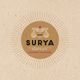 Logotipo redondo de Surya con diseño de rostro y texto: "Indian Street Food & Drinks".