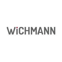 Textlogo "WICHMANN" in grau mit einem roten Punkt über dem "i".