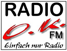 "Logo von Radio O.K. FM mit dem Slogan 'Einfach nur Radio' in Schwarz und Rot."