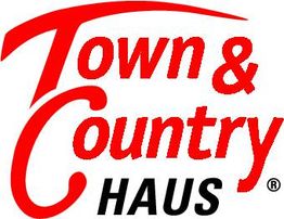 Logo mit roter Schrift "Town & Country", darunter schwarz "HAUS" auf weißem Hintergrund.