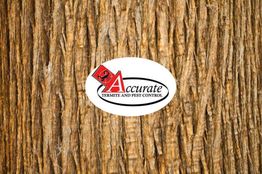 Wood texture with Accurate Termite and Pest Control logo in the center.