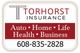 Torhorst Insurance sign with contact number and services: Auto, Home, Life, Health, Business.