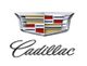 Cadillac logo with a crest above the brand name in cursive script.