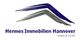 Logo von Hermes Immobilien Hannover mit abstrakten blauen und grauen Linien.