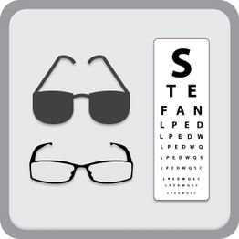 Gafas y tabla optométrica en blanco y negro, fondo gris claro.