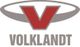 Logo mit rotem "V" in grauem Oval, darunter der Name "VOLKLANDT" in Großbuchstaben.