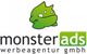 Grünes Monster-Logo mit der Aufschrift "monsterads werbeagentur gmbh" darunter.