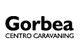 Texto del logo: Gorbea Centro Caravaning, en letras negras.